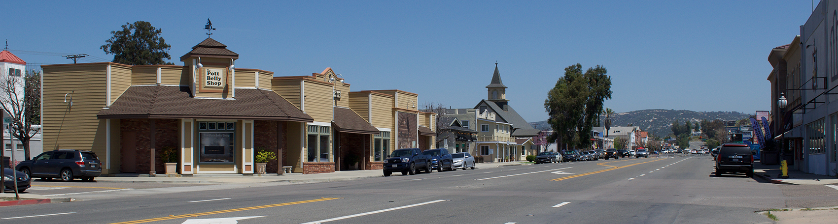 Exterior photo, local street with small businesses