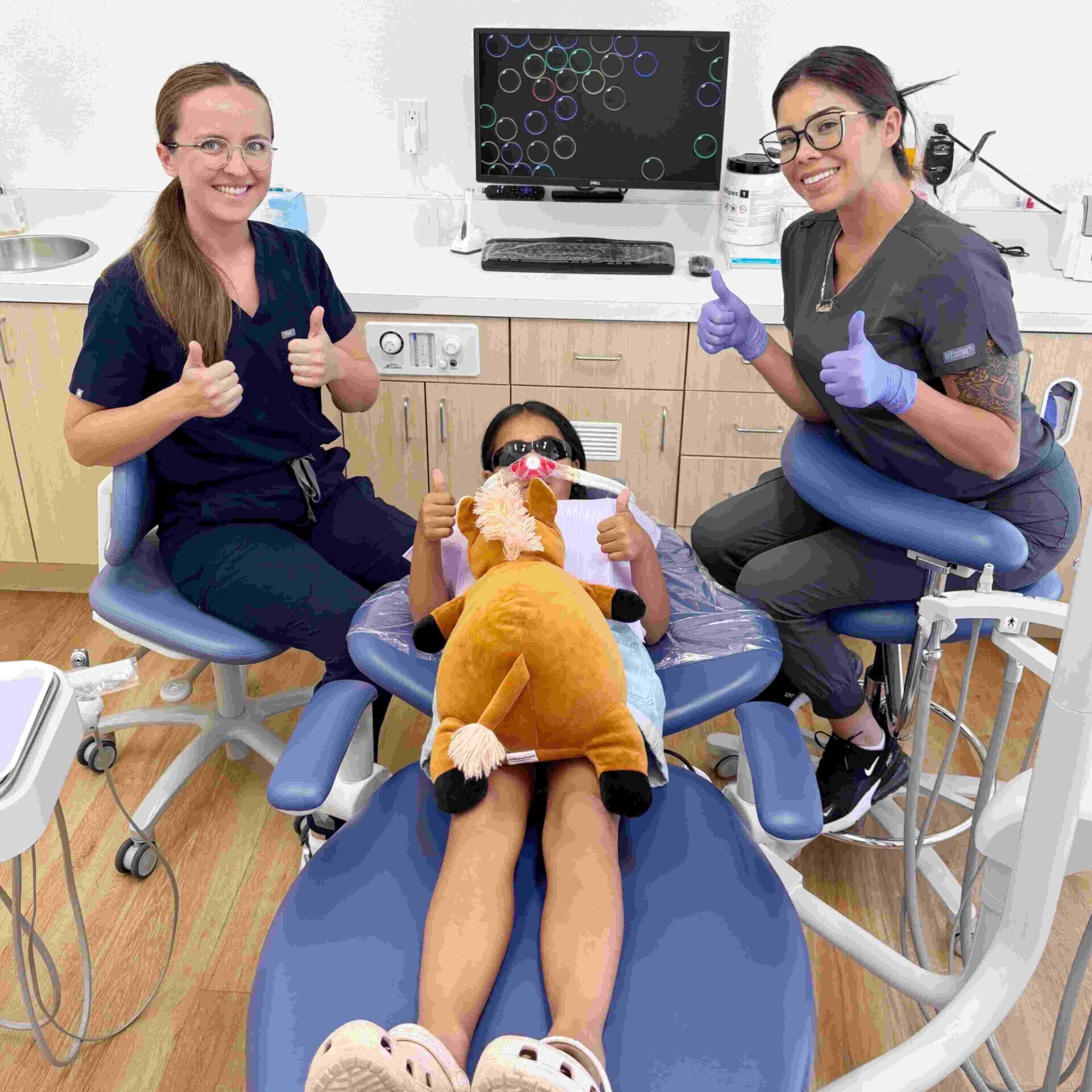Dr Christina with assistant and patient